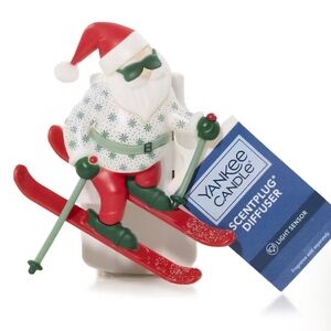 Santa On Skis Oil Diffuser & Light Sensor PLUS One Scent Christmas Yankee Candle